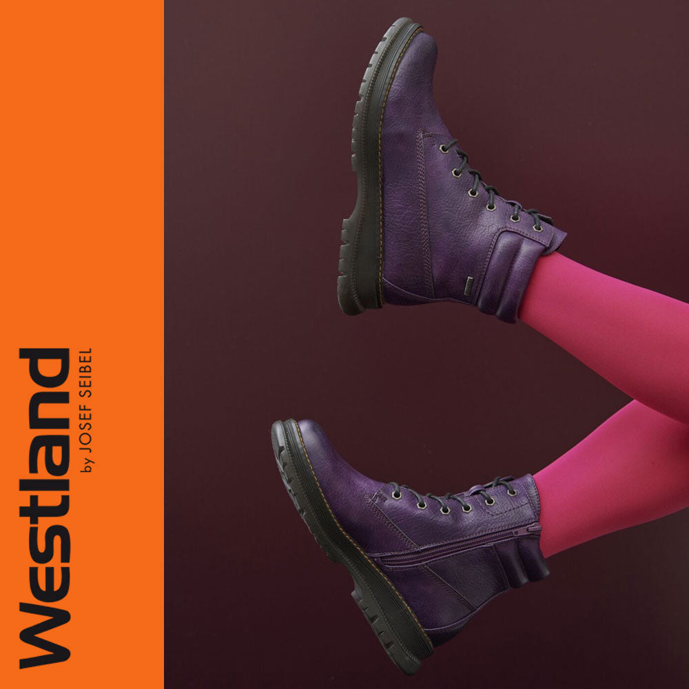 Purple boots with pink tights on a dark background, featuring Westland branding.