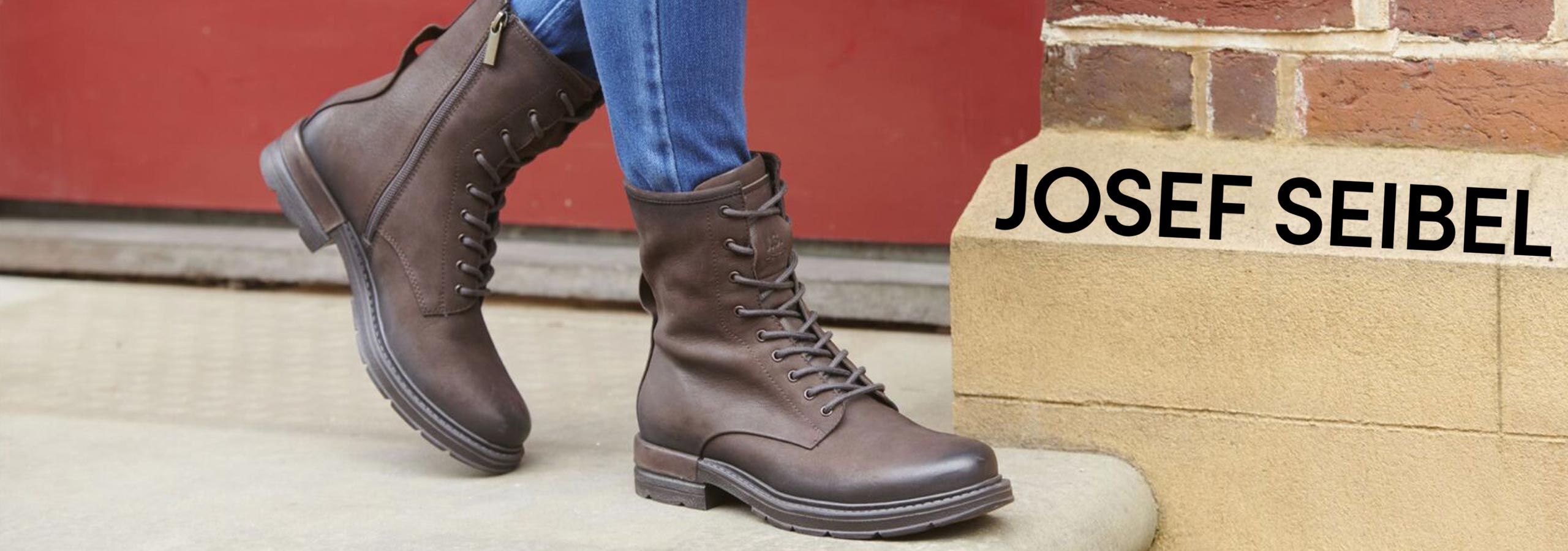 Brown boots being worn on a step with 'Josef Seibel' branding.